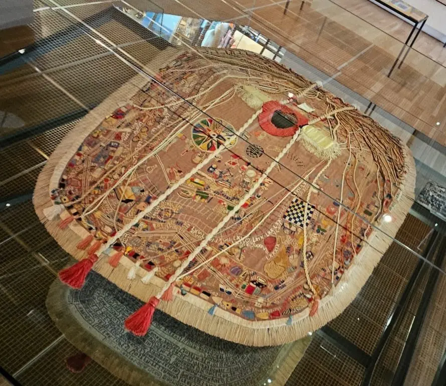 Arthur Bispo do Rosário's embroidered Presentation Mantle, displayed at the Calouste Gulbenkian Foundation in Lisbon.