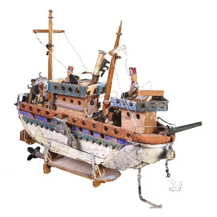 A carved and assembled wooden ship by Auguste Forestier, made between 1935 and 1949.