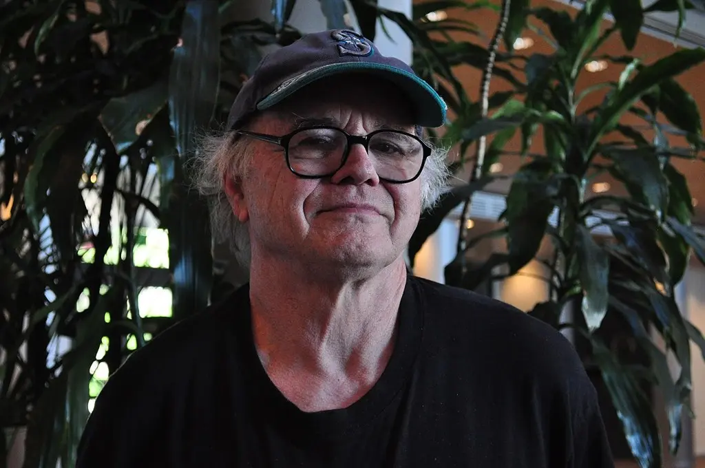Gregory Blackstock photographed at Seattle City Hall, where his work featured in an exhibition of Bumbershoot poster art.