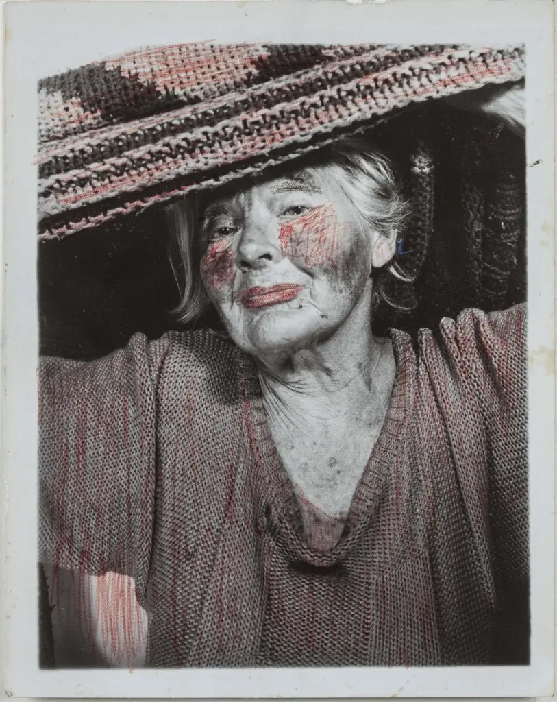 A hand tinted photo booth self portrait by Lee Godie.