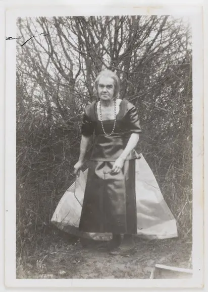 Marcel Bascoulard photographed outdoors wearing one of his handmade dresses.