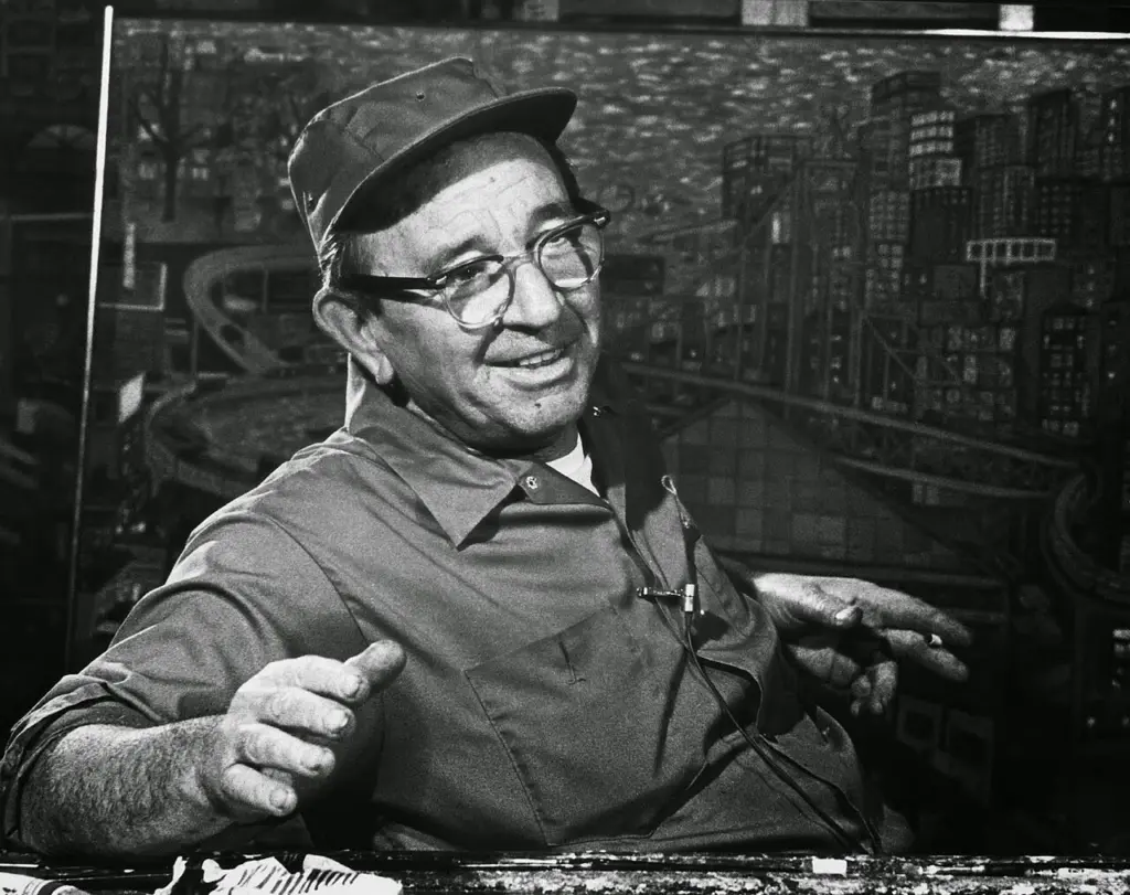 Ralph Fasanella in 1973, in front of one of his detailed city paintings.