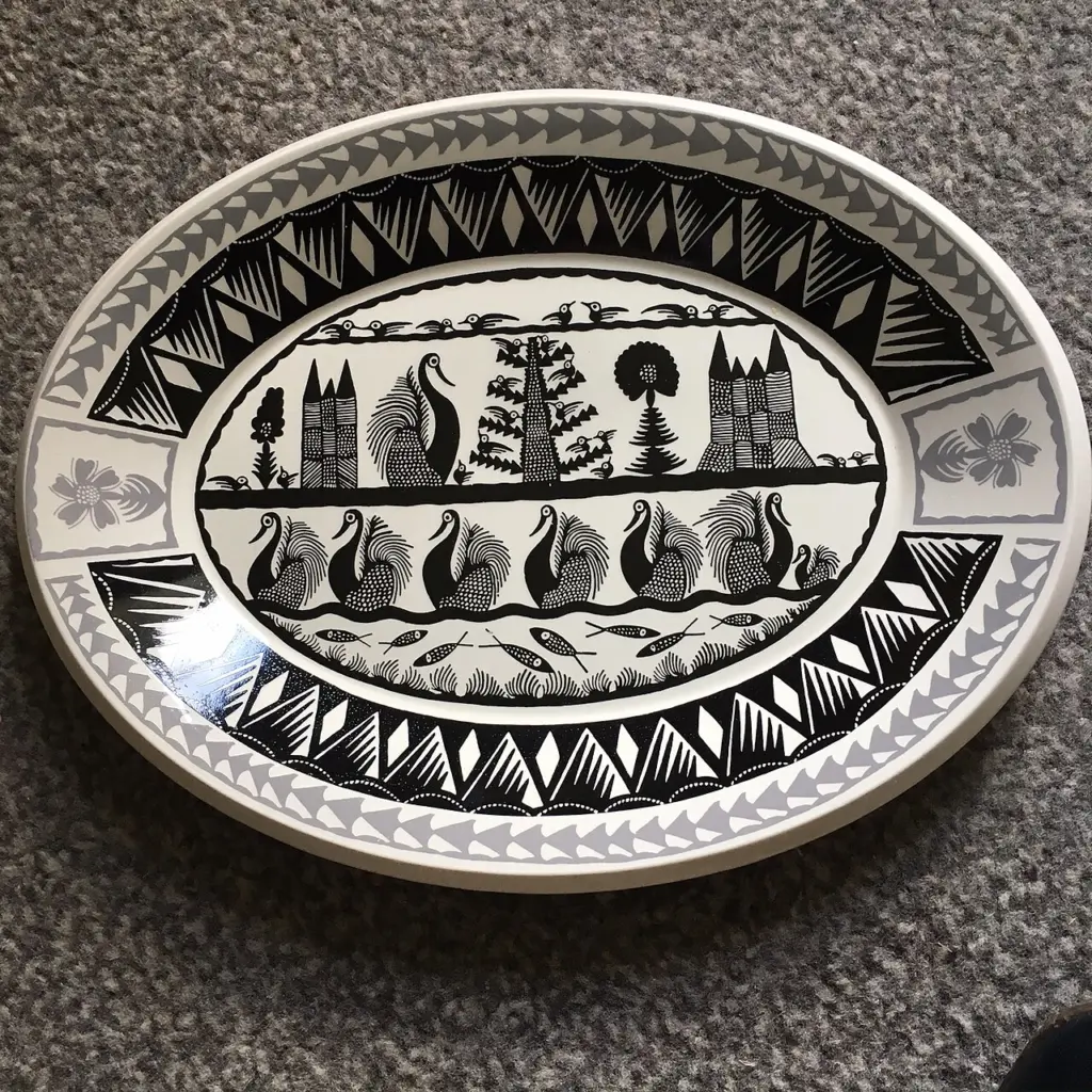 A Scottie Wilson design on a Royal Worcester platter.