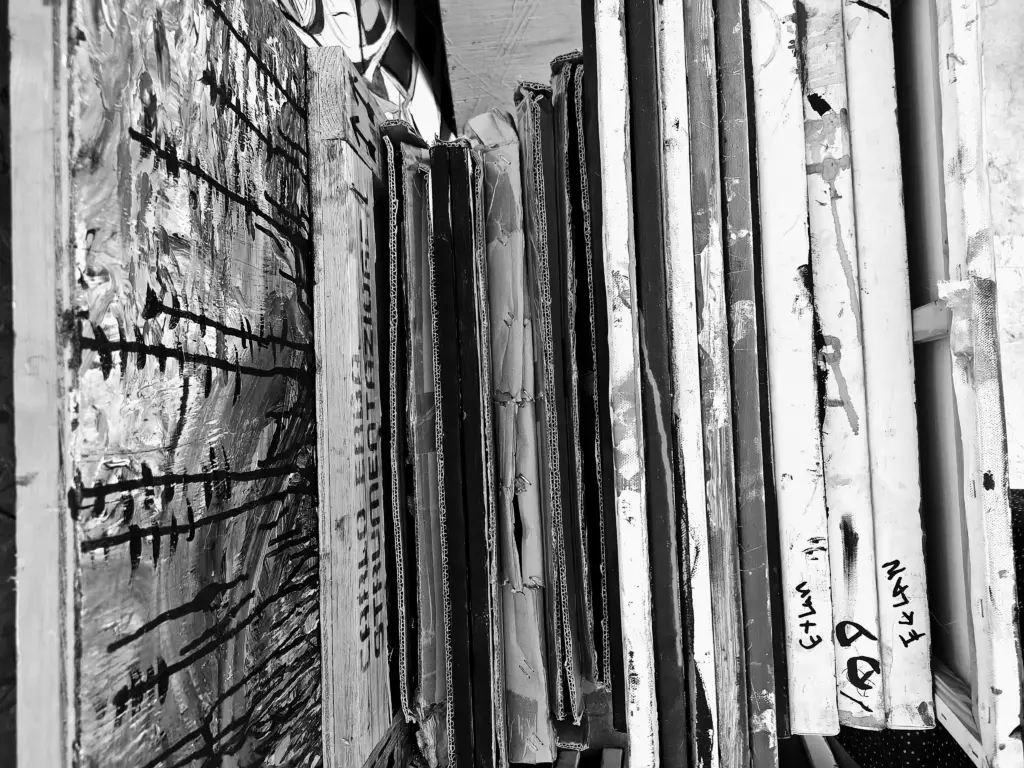 Stacks of paintings packed up and ready to move to Studio BRUT