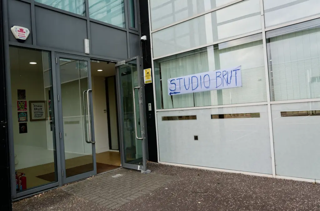 The entrance to Arclite House with the Studio BRUT sign in the window