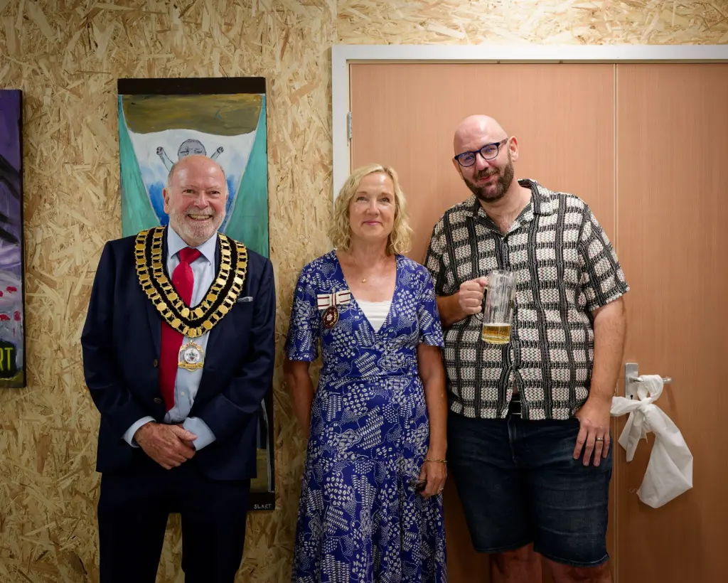 The Mayor of Swindon with Mrs Claire Garrett DL and co-founder SLART in front of a SLART painting