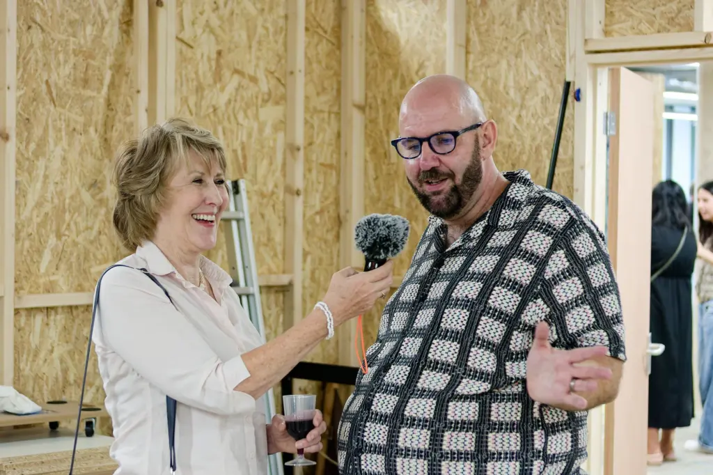 A radio interview being recorded at the opening night