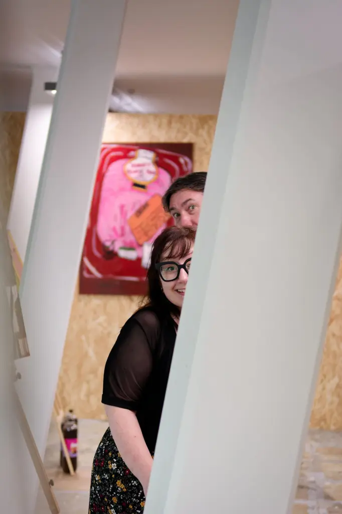 Guests browsing the artwork in the studio