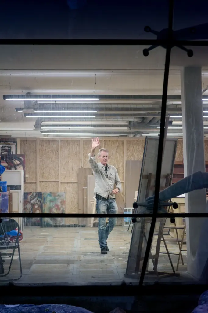 The studio interior seen through the glass